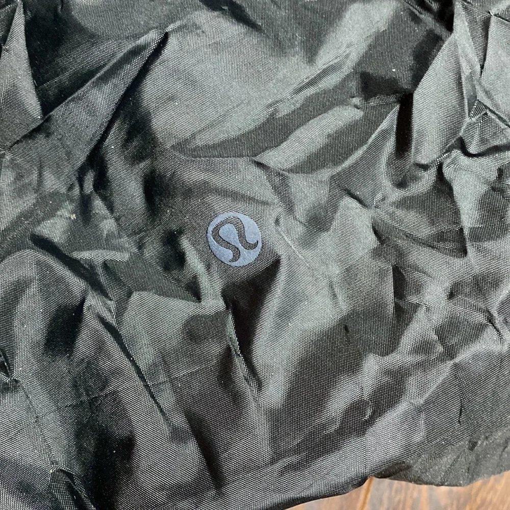 lululemon athletica Navy Backpack. Solid black. Stock picture is with blue trim - Picture 11 of 16